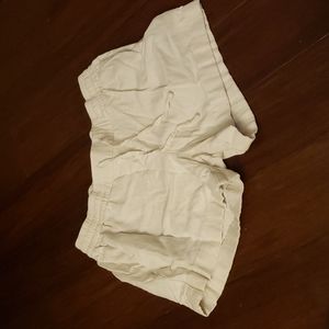 Cute light cream shorts medium size